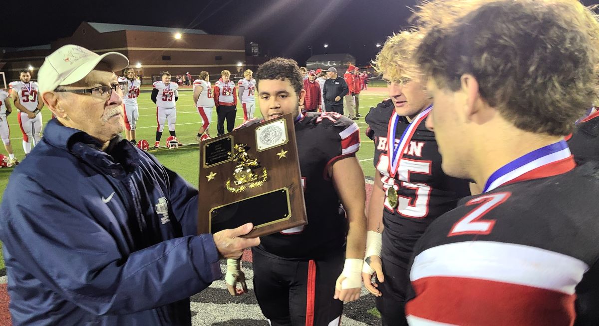 Tonkin hands Clearfield football championship plaque 2023